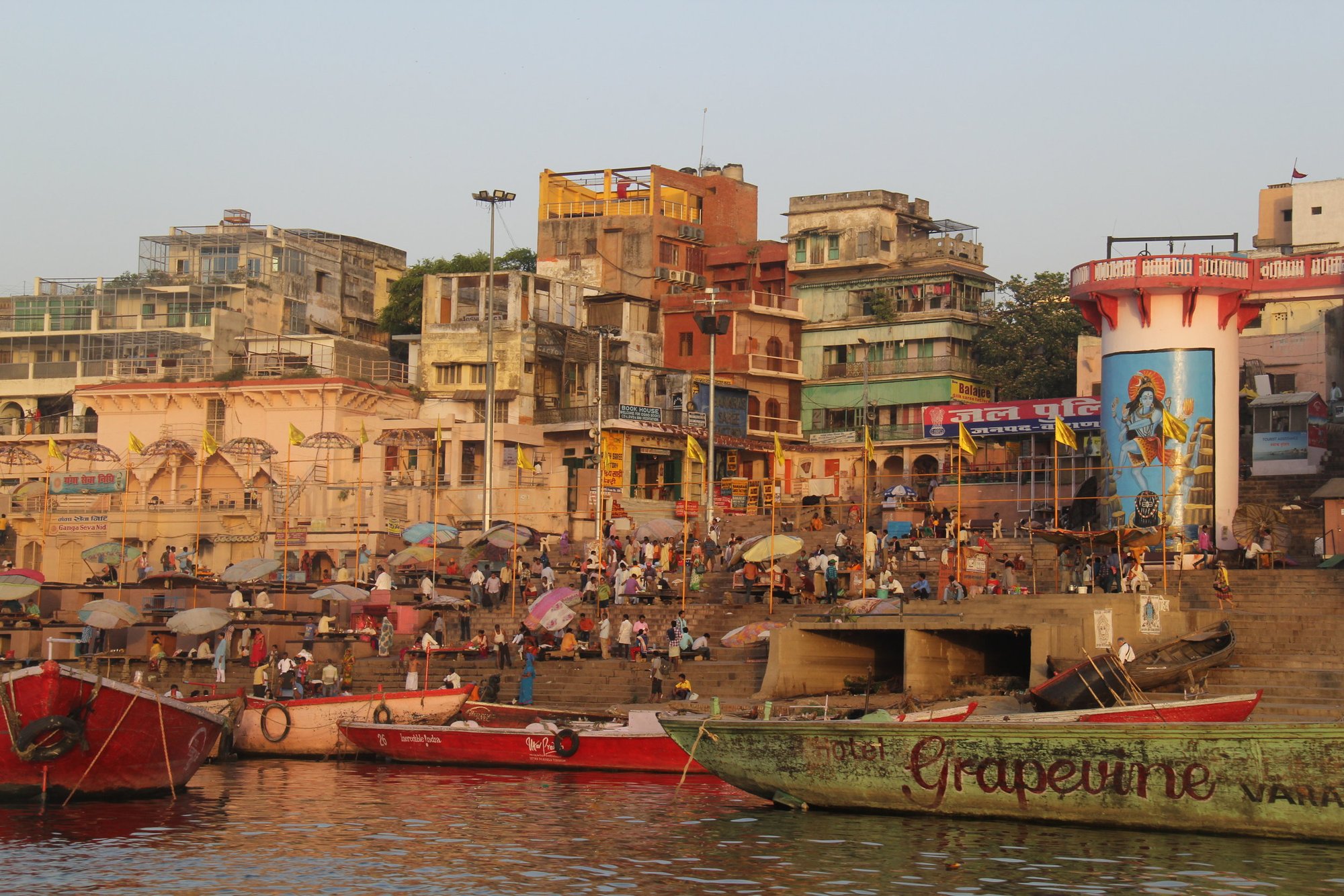 Boats and crowded stone steps along the Ganges in Varanasi, India